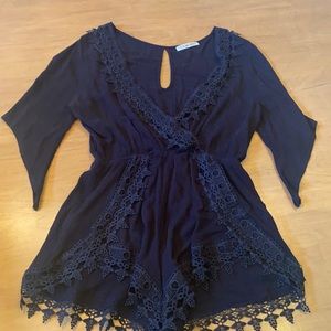 Super cute Black laced romper. Worn one time - perfect condition!